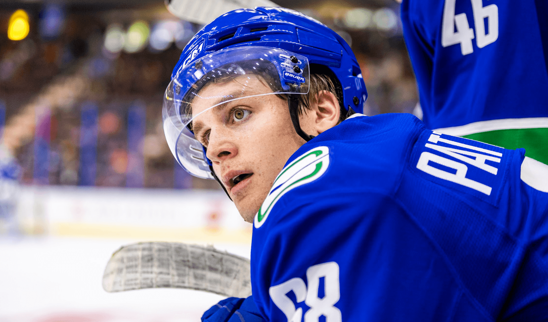 Forward Riley Patterson leans over the bench during the Vancouver Canucks' 2-0 win over the Edmonton Oilers at the 2024 Young Stars Classic from Penticton, BC